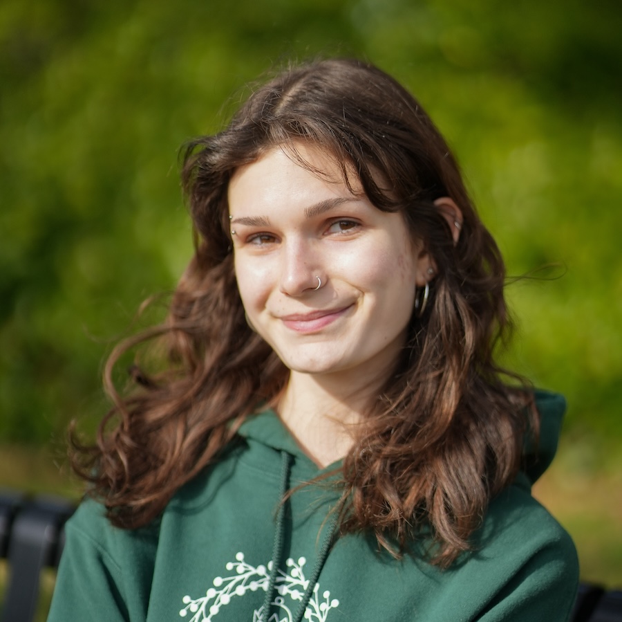woman wearing green sweatshir