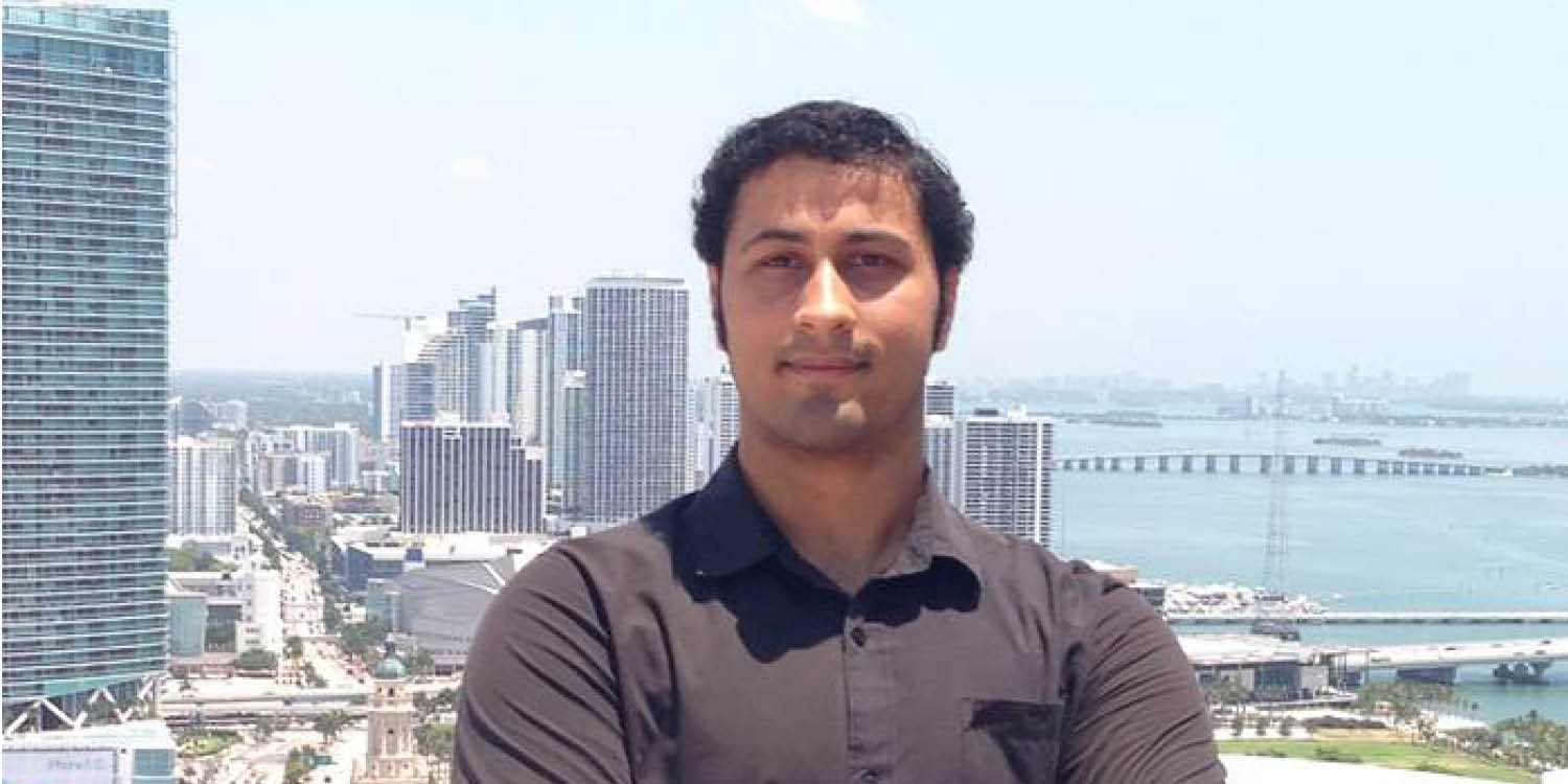 Photo of Alum Maanas Tripathi with city scape in background