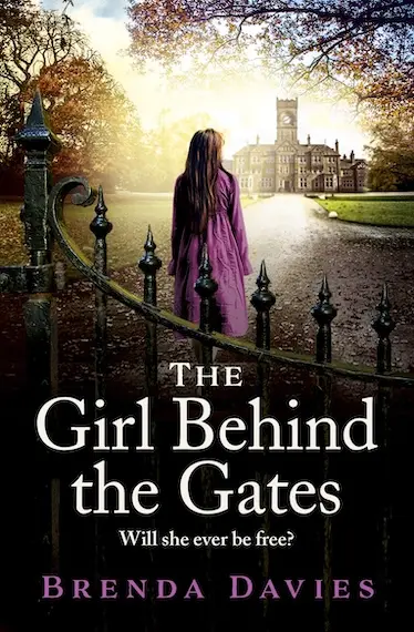 an image of the cover of The Girl Behind the Gates