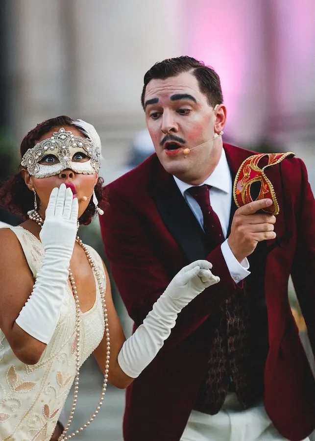 two theatre students in costumes