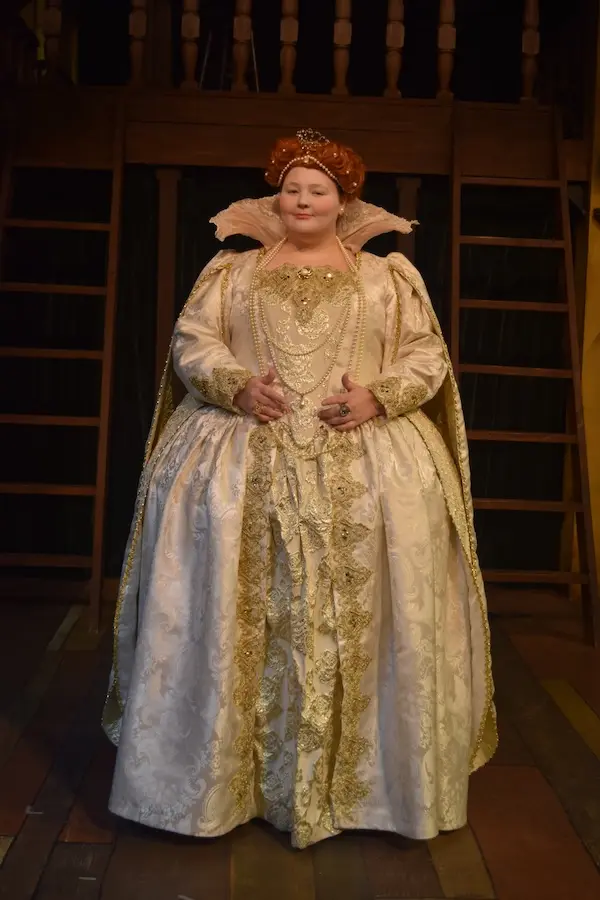 an actor dressed up as Queen Elizabeth