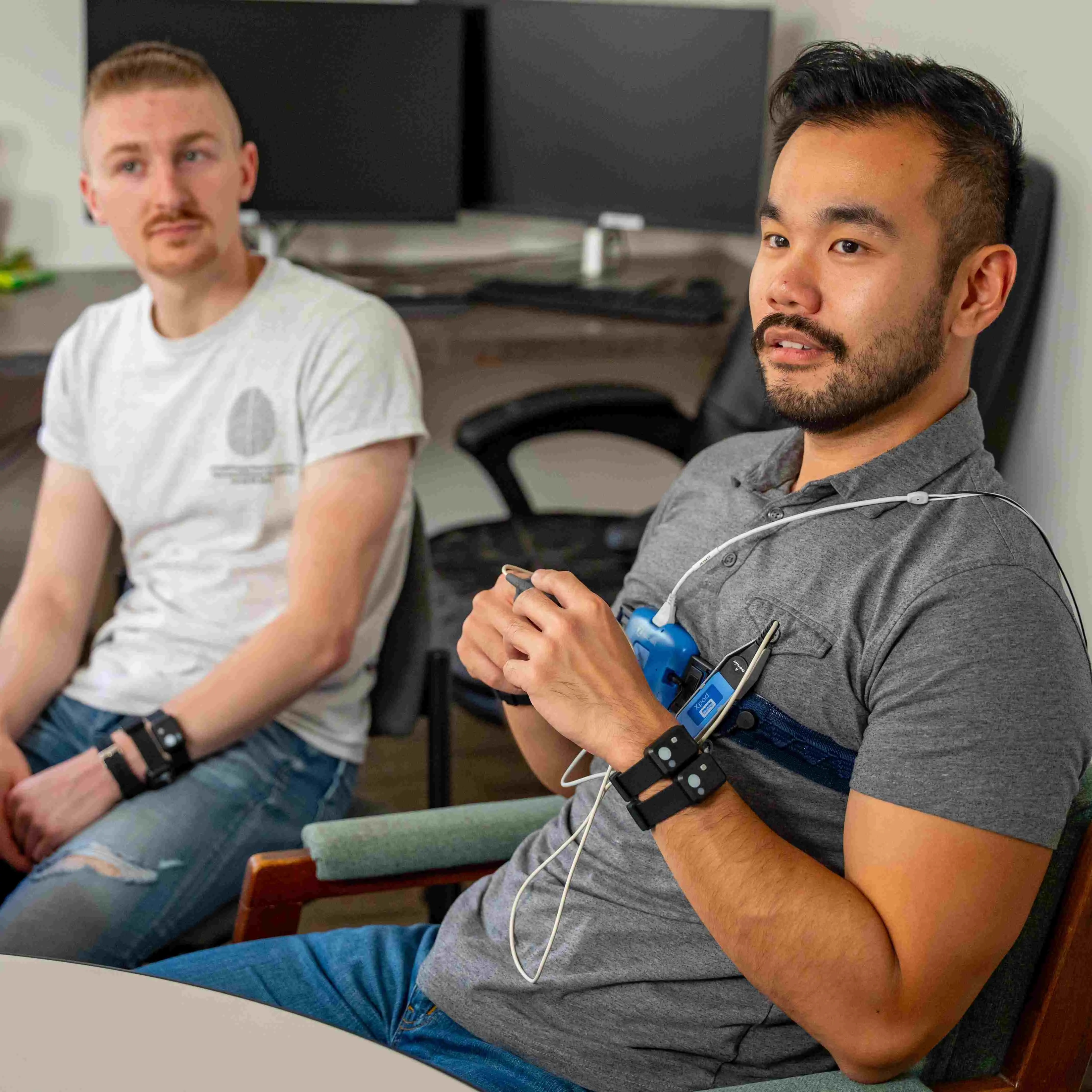 two men wearing sleep equipment