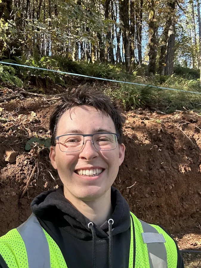 a selfie of a man in the forest