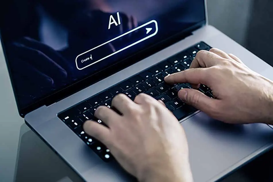 Typing AI promt on Laptop
