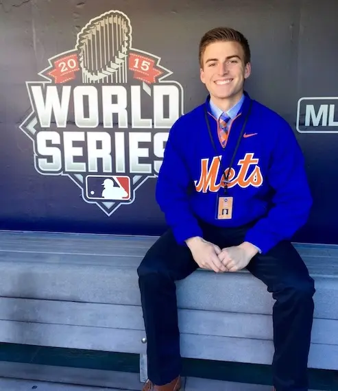 Matt Derhalli in a baseball dugout