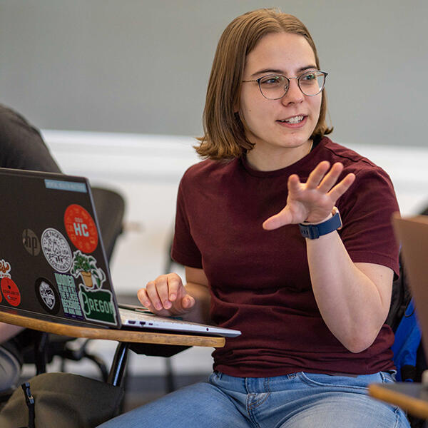 economics student with computer